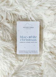 Nittany Candle Company Penn State themed wax melts on a fluffy white surface