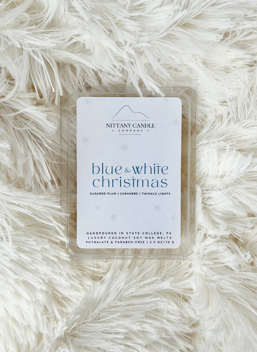 Nittany Candle Company Penn State themed wax melts on a fluffy white surface