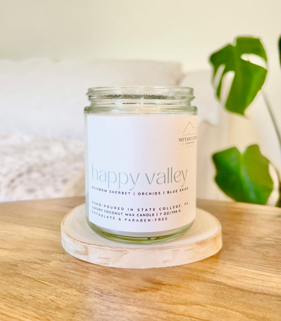 Candle jar labeled "Happy Valley" by Nittany Candle Company