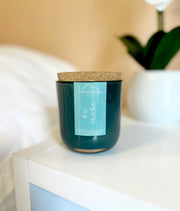 Wood wick candle with cork lid that smells like a library and is made with nontoxic ingredients
