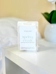 Fresh and clean scented wax melt called "Spring Creek"