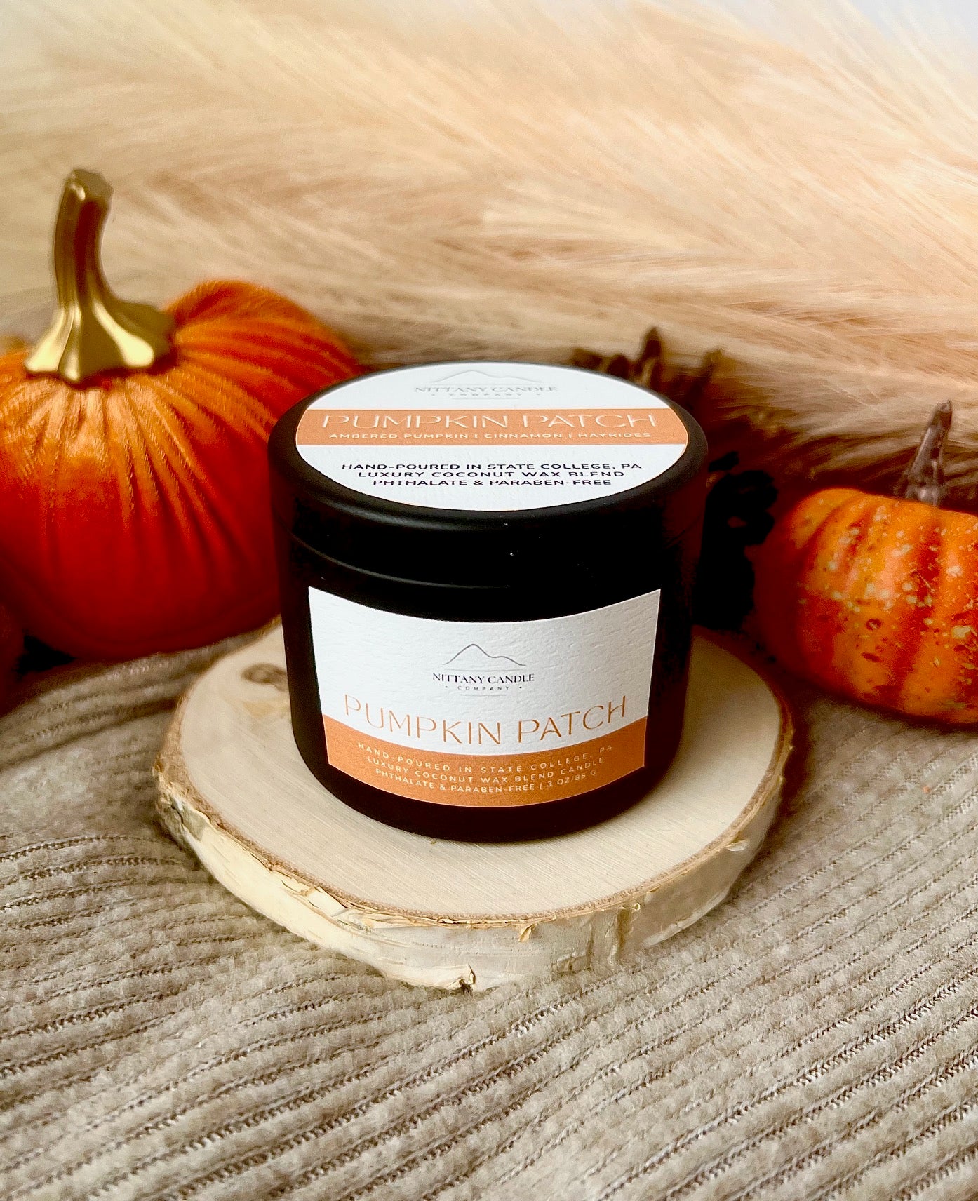 State College candle maker pumpkin candle with fall decor 