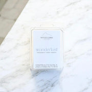 Nittany Candle Co. wax melt packaging on a marble surface