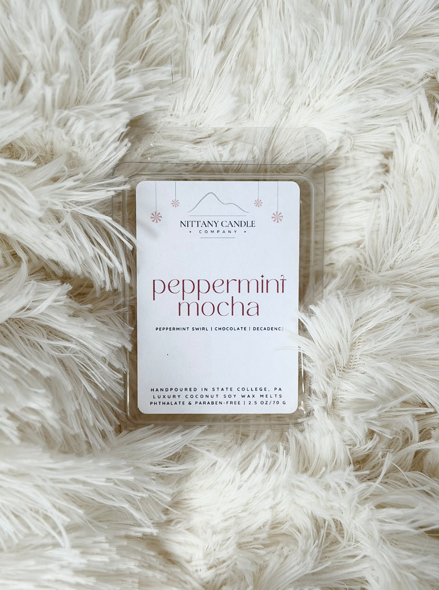 Nittany Candle Company peppermint mocha wax melts on a fluffy white surface